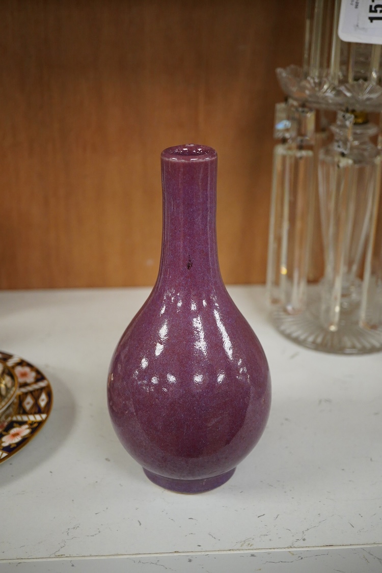A Chinese crimson glazed bottle vase, 19cm